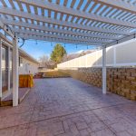 Pergola,Roof,With,Stringlights,Above,The,Stone,Tiles,Ground,At